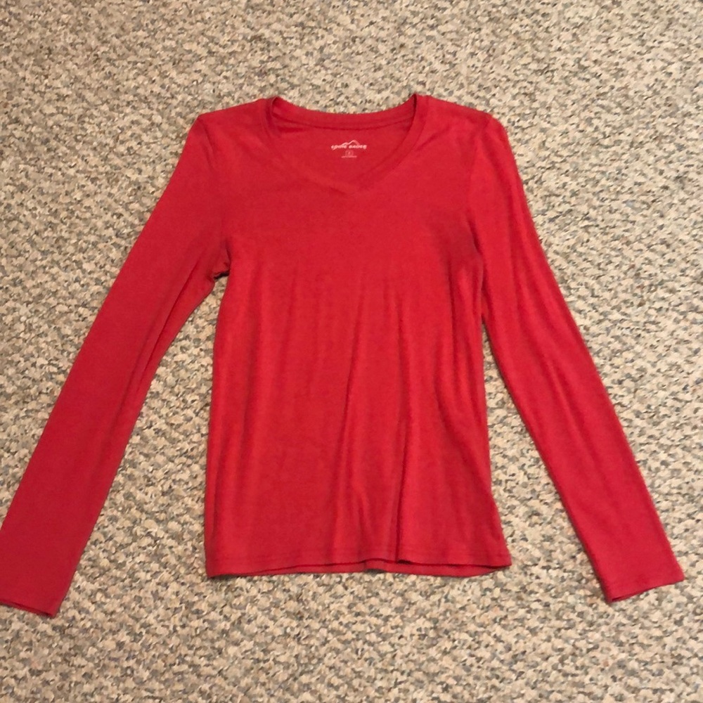 A raspberry colored long sleeve Eddie Bauer top.
